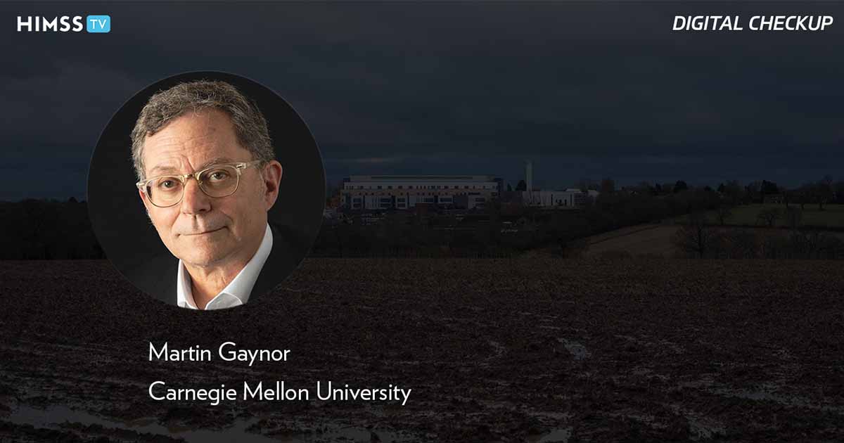 Martin Gaynor, Carnegie Mellon University_Muddy field with hospital in background_Jason Jones Travel Photography/Moment/Getty Images