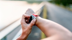 
  A close up of a person wearing a smartwatch.
