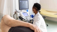 Imaging technician with patient