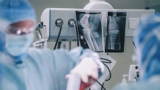 Surgeons doing operation in hospital operating room