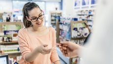 Woman interacting with a pharmacist