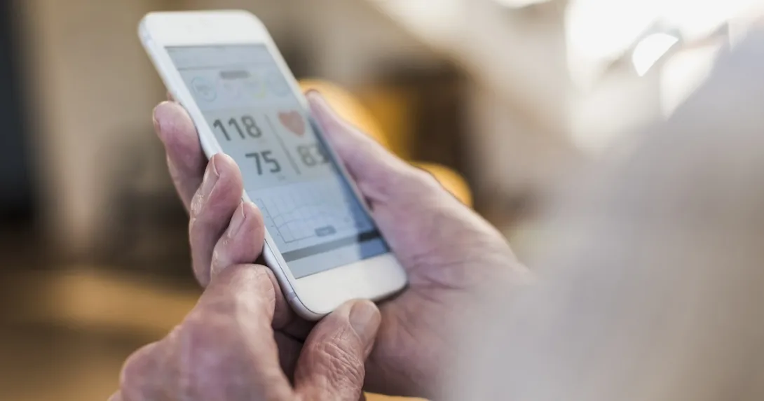 Person reviewing data on a cell phone screen