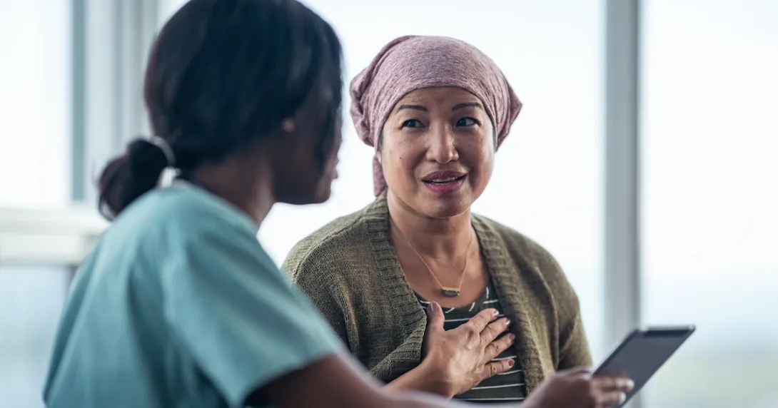 Healthcare professional consulting with a patient