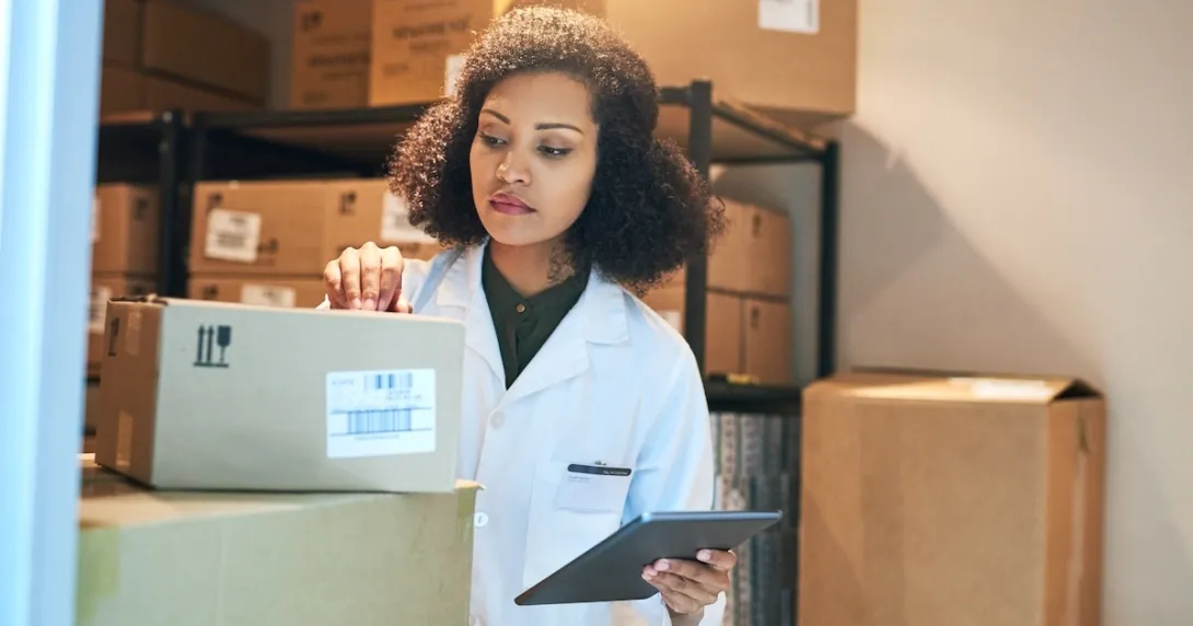 Pharmacist preparing to ship product