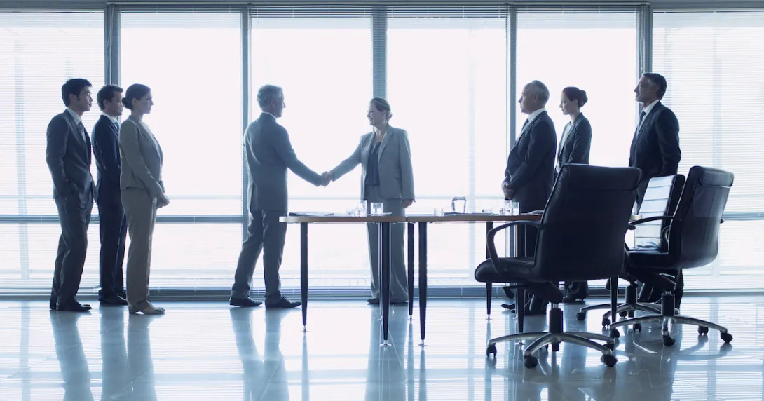 
  Businesspeople shaking hands.
