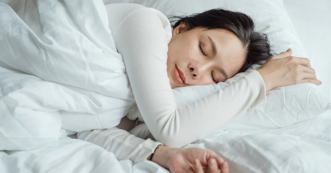A person sleeping in bed