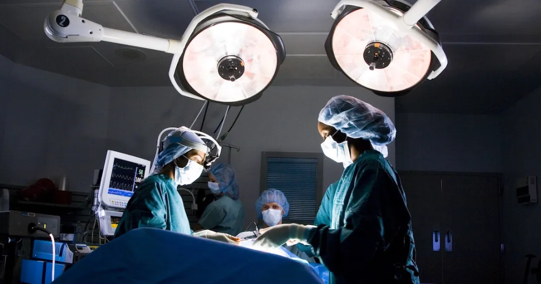 
  Surgeons during an operation.
