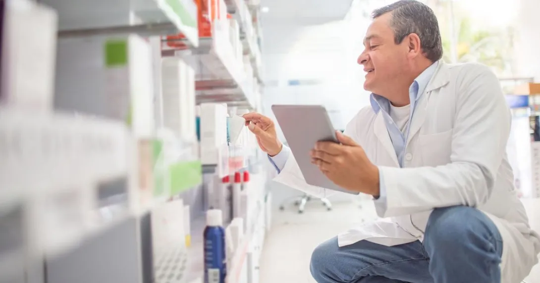 Person in a pharmacy setting Person in a pharmacy setting