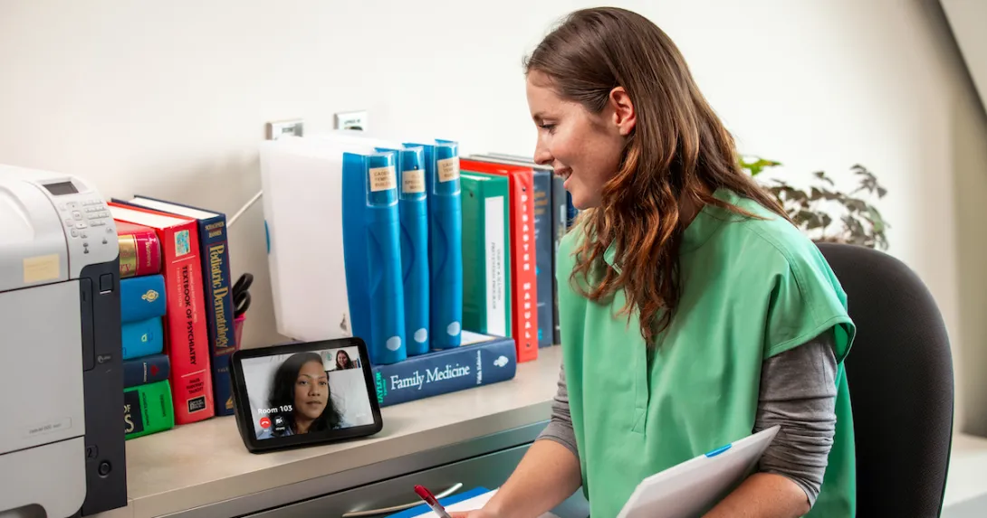 A provider talks to a patient using an Alexa-enabled device A provider talks to a patient using an Alexa-enabled device